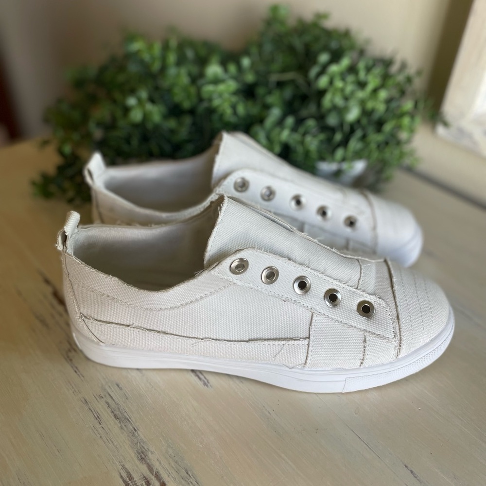White canvas slip on sneakers